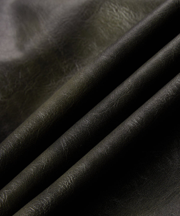 Close-up of the sleeve cuff and buttons on the men's casual faux leather jacket