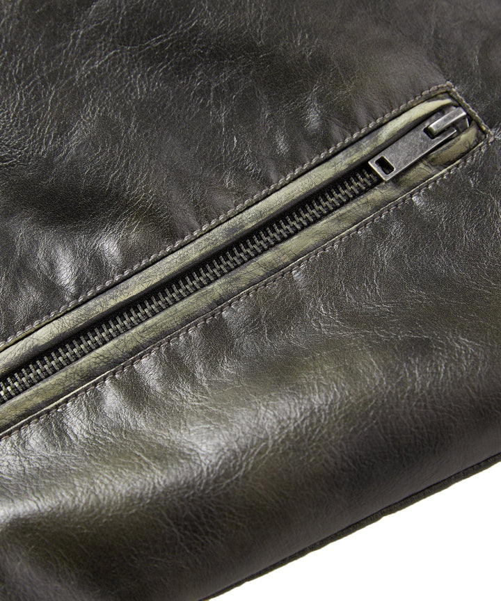 Side profile of men's rugged faux leather jacket, showcasing fit and collar style