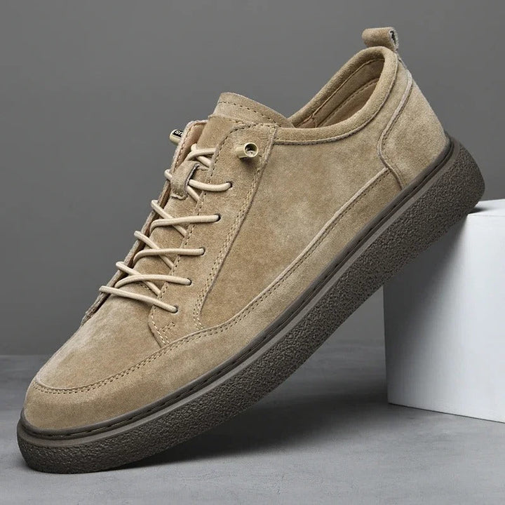 Beige suede low-top sneakers for men, perfect for casual wear and daily comfort.