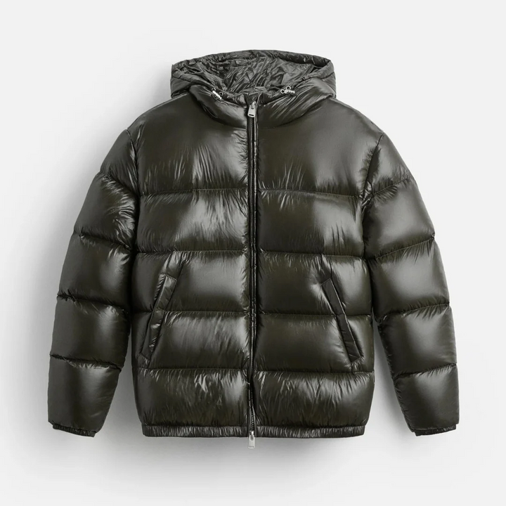 Close-up of a men's shiny quilted puffer jacket with hood, perfect casual winter jacket