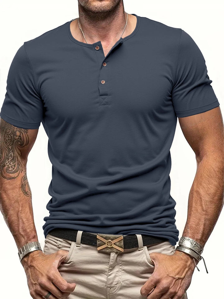 Slim fit men's Henley tee, short sleeve, ribbed collar. Stylish and versatile for men's casual fashion.