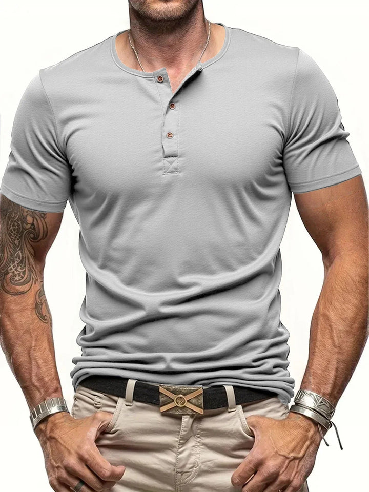 Comfortable men's short sleeve Henley top, ribbed collar, perfect for summer casual wear.