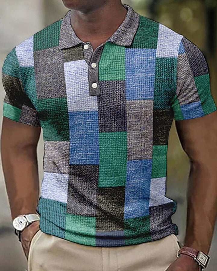 Men's short sleeve polo shirt with modern check grid pattern. Relaxed fit, perfect for casual summer wear.