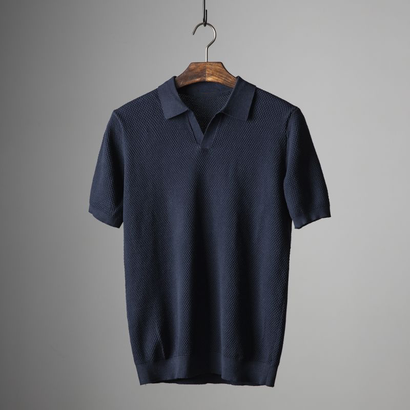 Versatile men's short sleeve polo shirt in a soft textured knit. Essential for smart casual men's fashion.