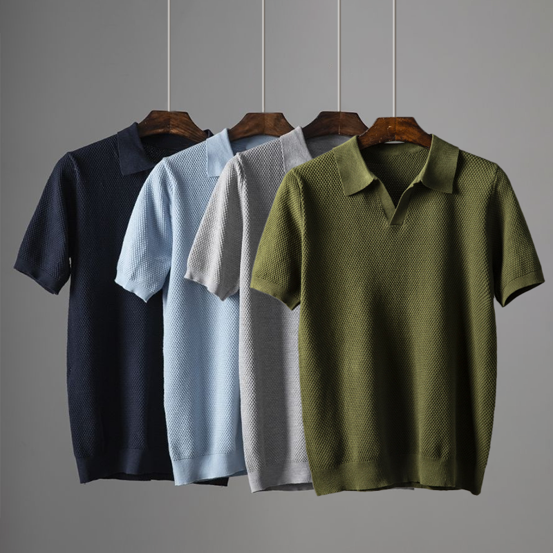 Geometric pattern men's polo, short sleeve and textured knit. A stylish and comfortable summer top.