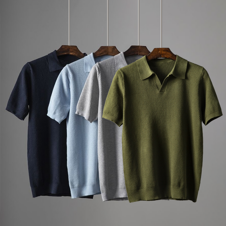 Geometric pattern men's polo, short sleeve and textured knit. A stylish and comfortable summer top.