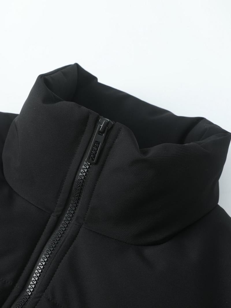 Casual men's black puffer coat. Insulated polyester jacket. Sleek and warm winter wear.
