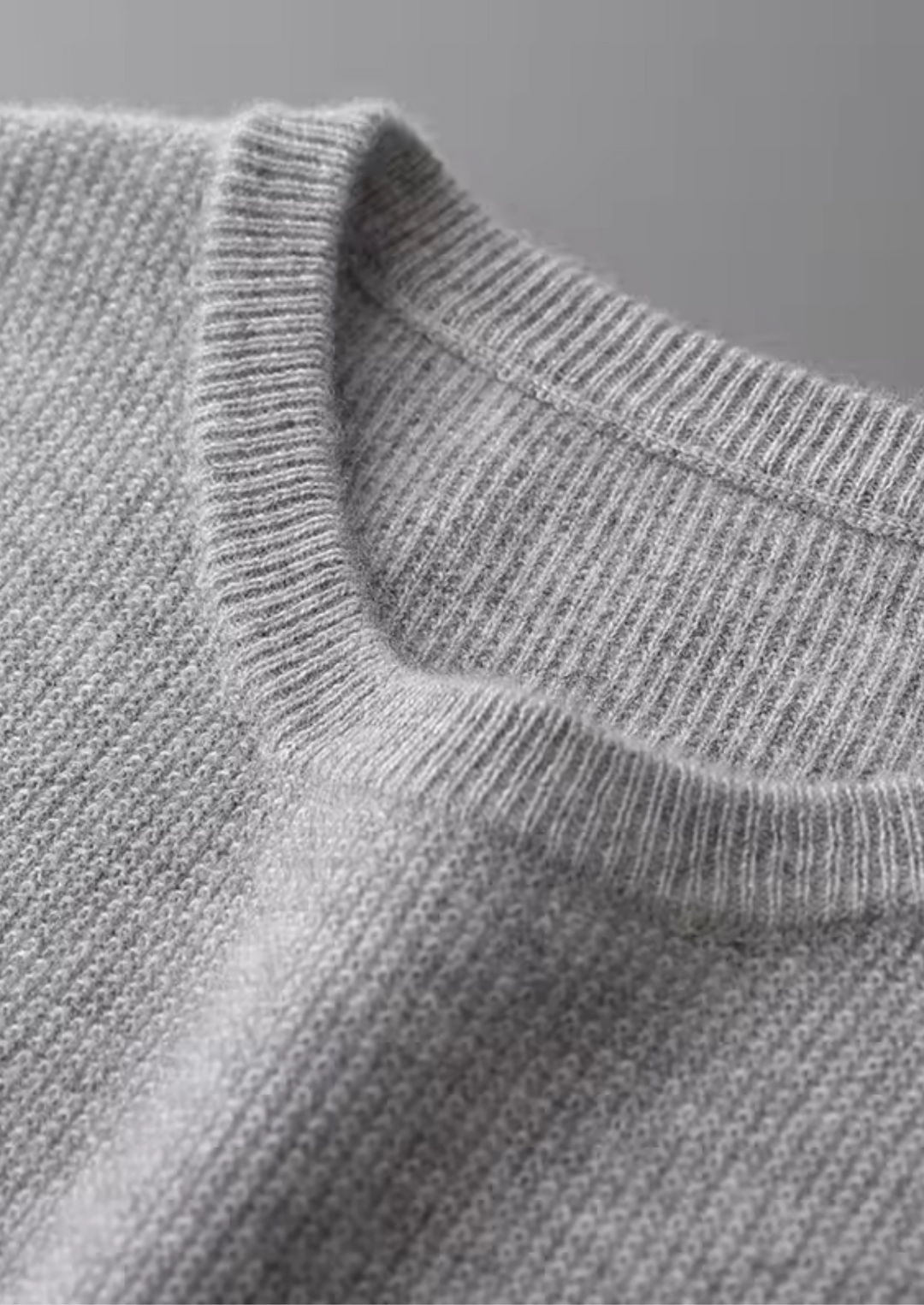 Light blue men's crew neck vest, perfect for versatile layering. Soft cotton blend, essential for men's fashion.