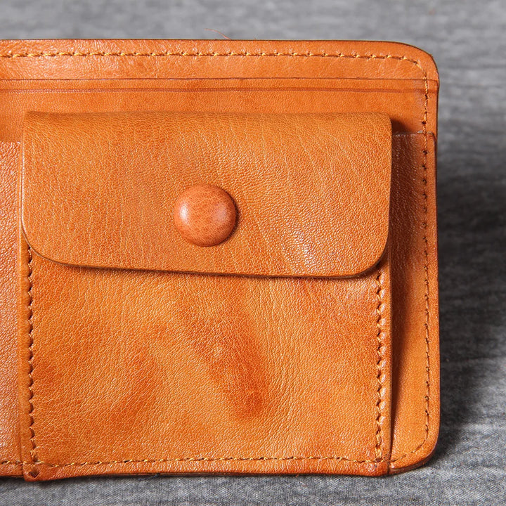 Backside of a men's leather bifold wallet, clean and unadorned.