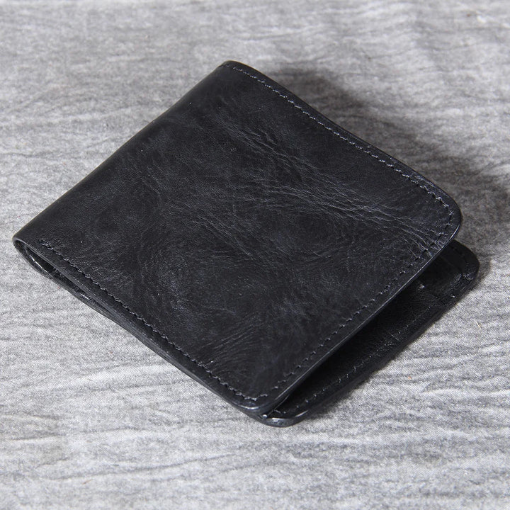 Men's bifold wallet with RFID blocking, a secure slim leather card holder.