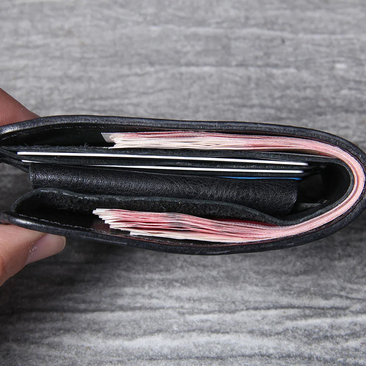 Empty men's slim bifold wallet, ready for cards and cash, includes coin pouch.