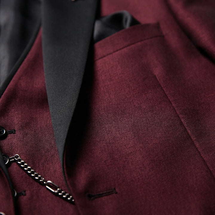 Elegant 3-piece slim-fit men's formal suit with a stylish contrast lapel, perfect for special occasions.