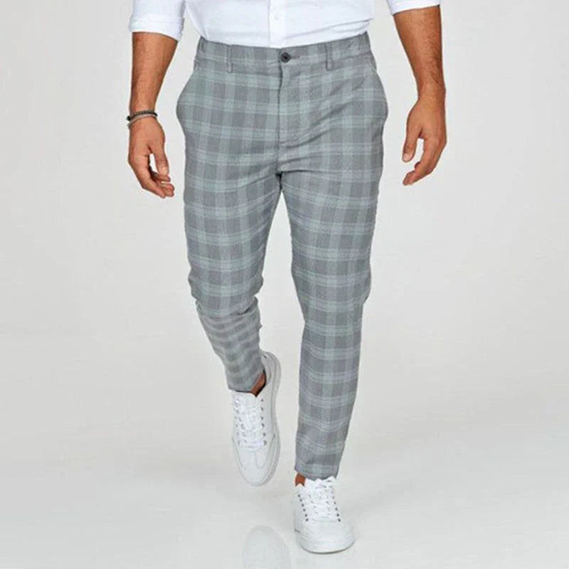 Tapered men's slim fit checked trousers, ankle-length for a contemporary, sharp style.