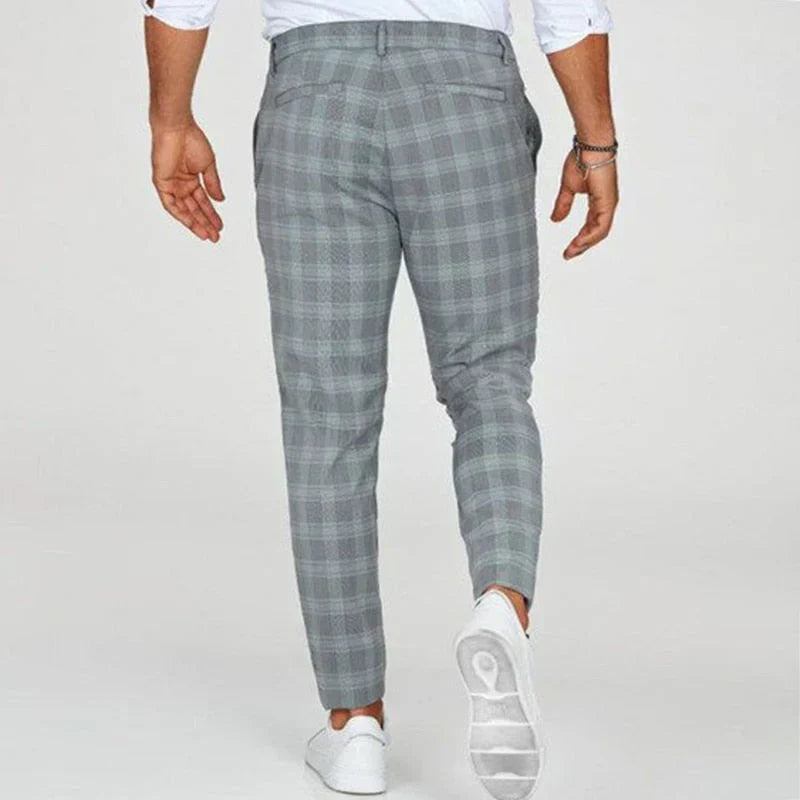 Versatile men's cropped checked pants, slim fit design ideal for various smart casual outfits.