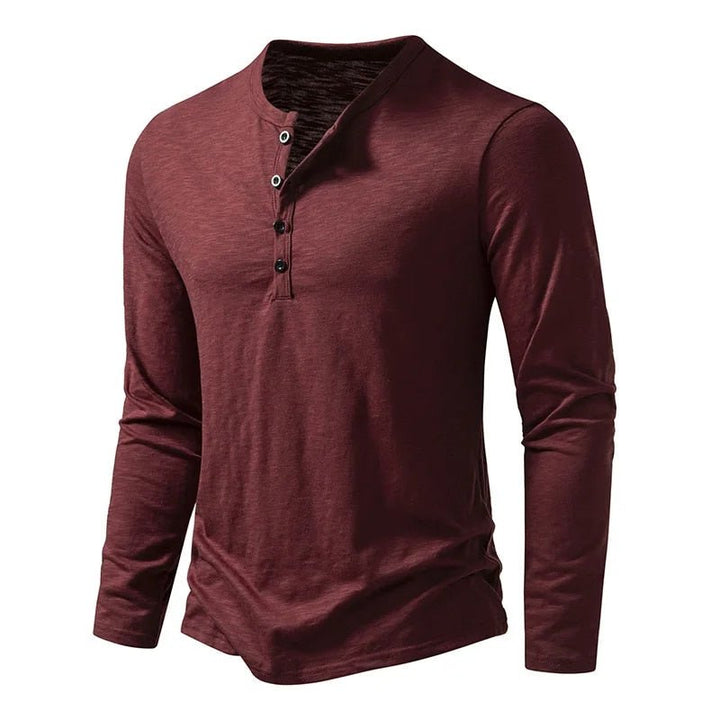 Comfortable men's slim fit henley, long sleeve top with a stylish button placket.