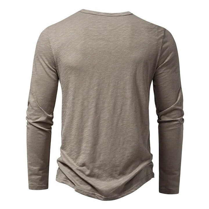 Versatile men's slim fit henley, ideal for layering or everyday fashion.