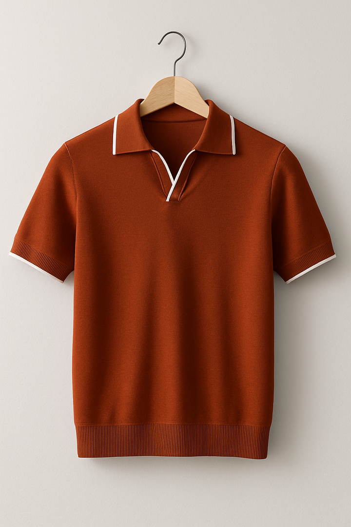 Textured knit men's polo, slim fit with short sleeves. Elegant contrast trim, suitable for summer fashion.