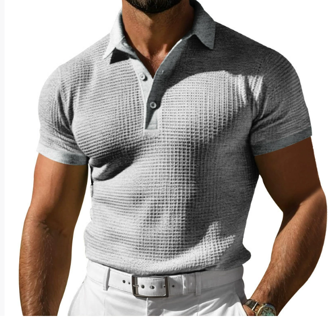 A modern men's slim fit polo shirt, short sleeve with a textured collar, suitable for everyday and smart casual style.
