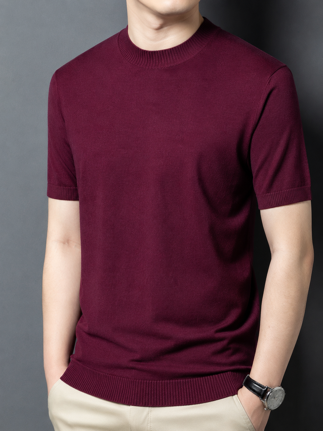 Modern men's slim fit mock neck tee, short sleeve, breathable for active wear.