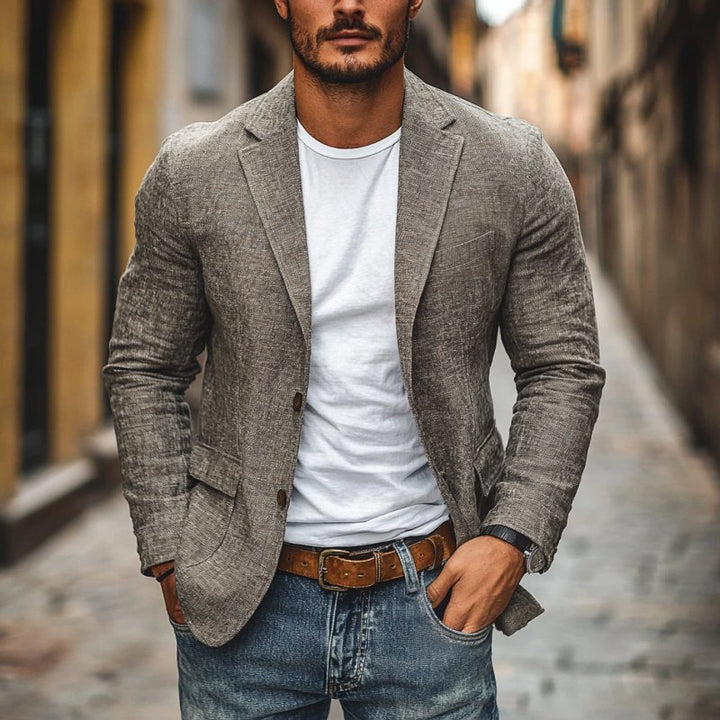 Stylish men's slim fit single-breasted blazer for a sharp, contemporary business casual outfit.