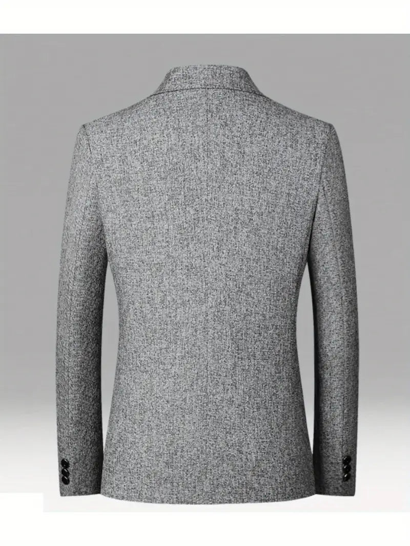 Modern men's blazer in a slim fit, ideal for spring fashion, offering versatile smart casual style effortlessly.
