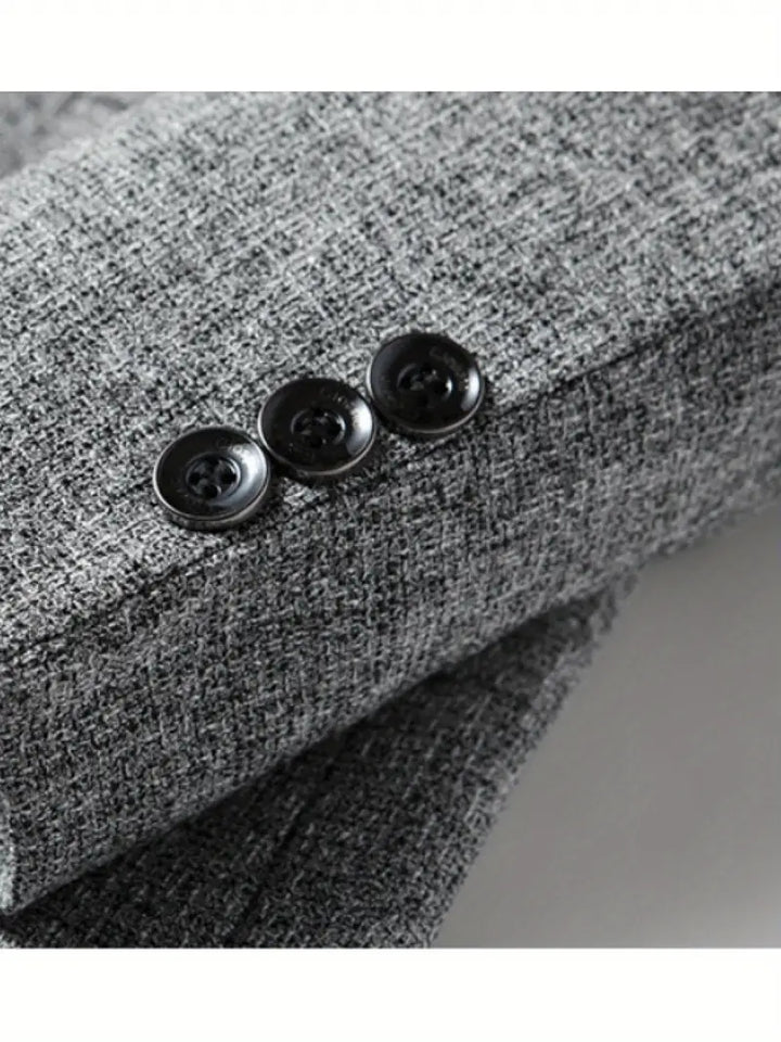 Polished men's slim fit blazer, a contemporary casual suit jacket for versatile spring fashion and outerwear.