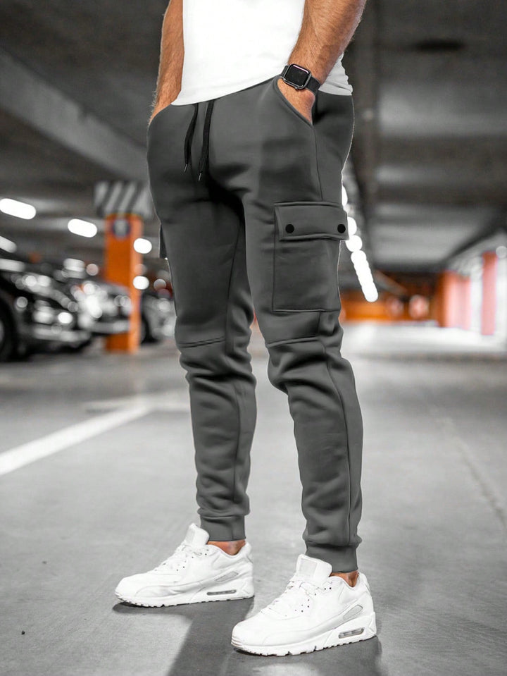 Sporty casual men's joggers, slim-fit streetwear pants for active & relaxed comfort.