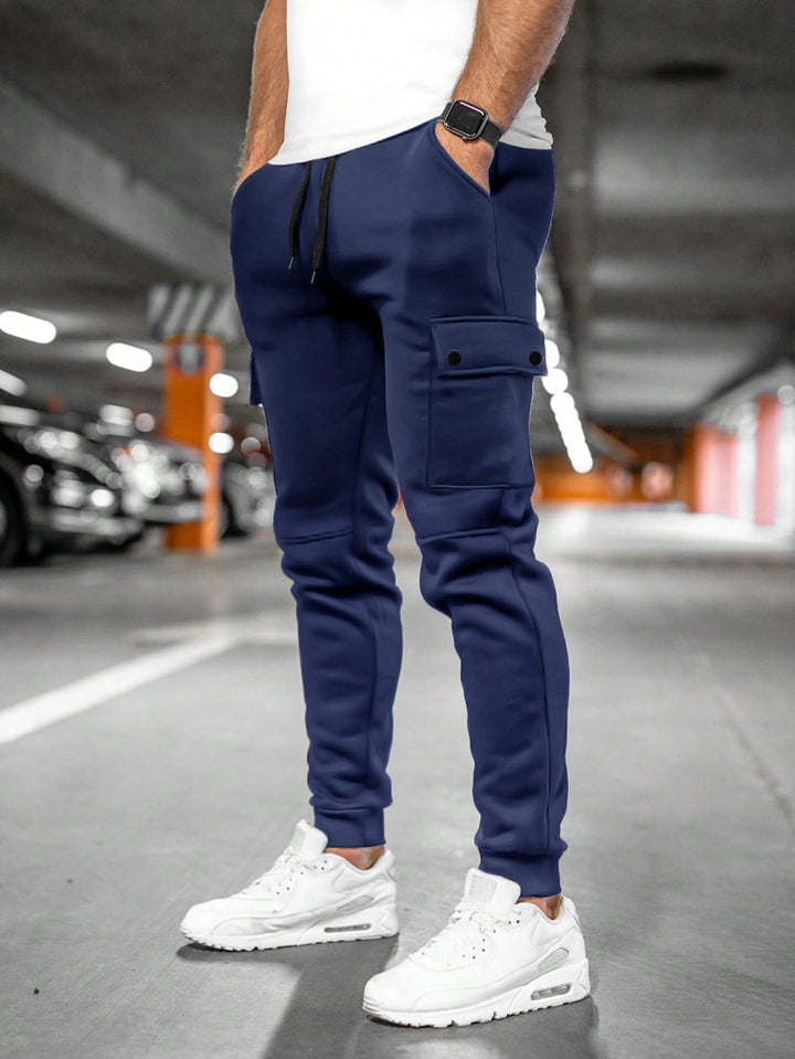 Contemporary men's slim-fit joggers, perfect for a casual, comfortable, and trendy streetwear look.