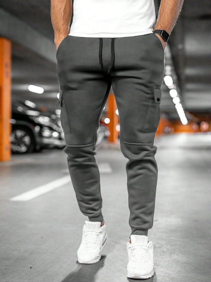 Modern men's streetwear joggers, slim fit design for a sporty yet relaxed look.