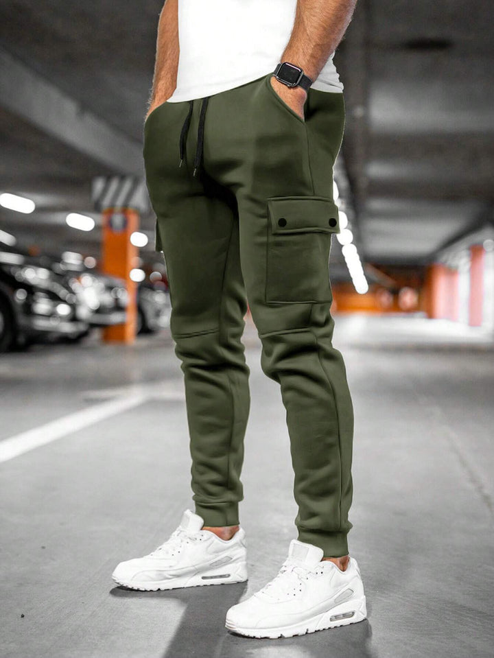 Men's tapered leg joggers, slim-fit streetwear pants offering casual style & flexibility.