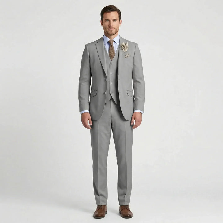 Sharp men's slim fit three-piece suit. Essential formal wear for business, weddings & elegant evening events.