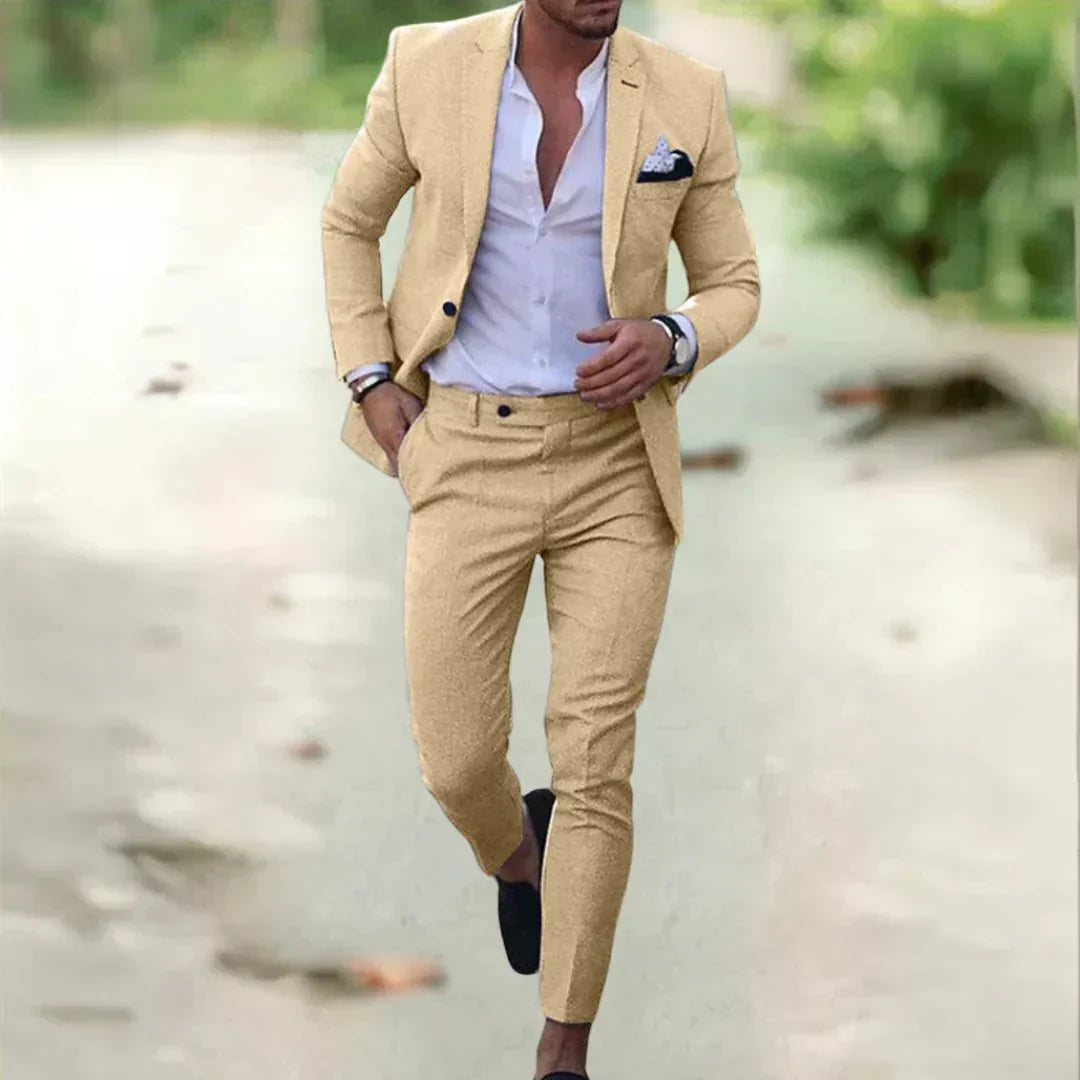 Tailored men's slim fit two-piece suit, perfect for groom or wedding guests, ensuring a sharp & modern formal style.