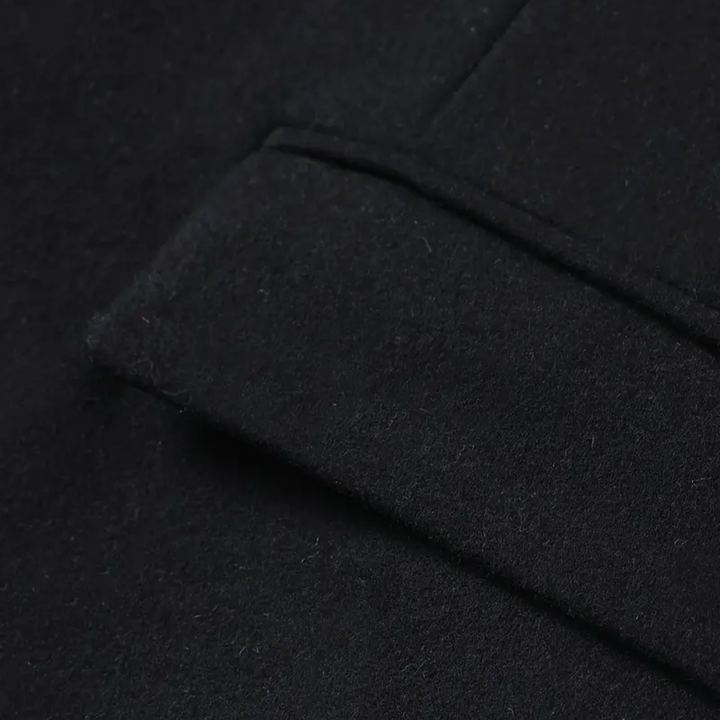 Fashionable men's slim fit trench coat. A long winter jacket with a stand collar, offering a modern, elegant look.