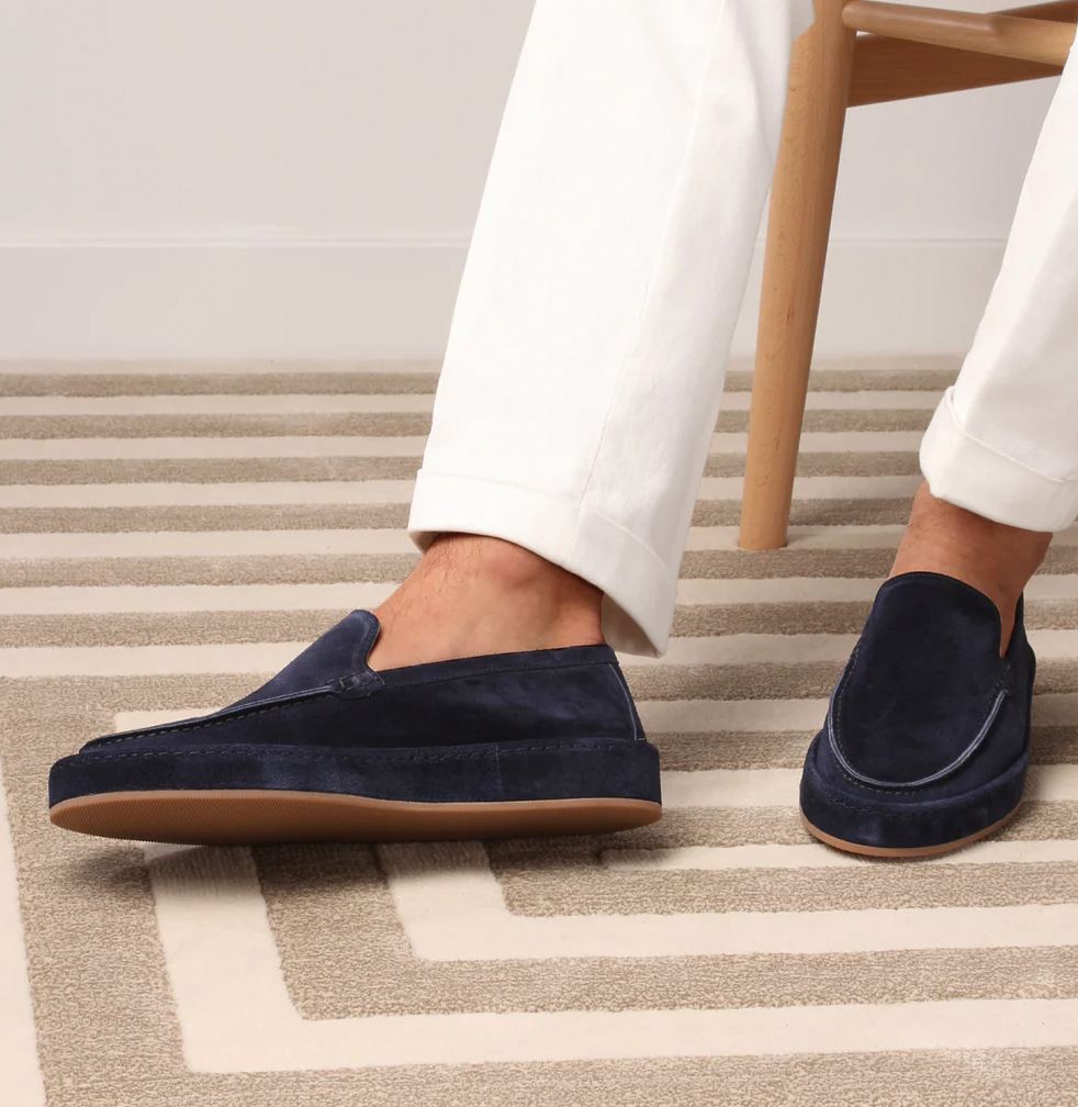 Classic men's slip-on loafers with cushioned interior. Elegant design for smart casual and business wear.