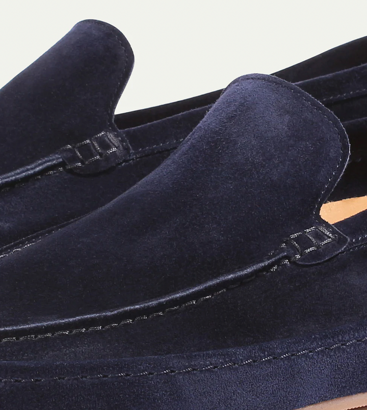 Premium men's slip-on loafers, designed for cushioned comfort, elegant style & versatile everyday wear.