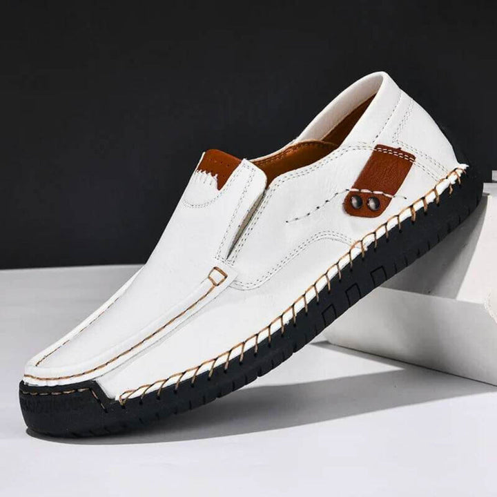 Durable men's slip-on footwear with versatile style, excellent arch support, perfect for smart casual & daily use.