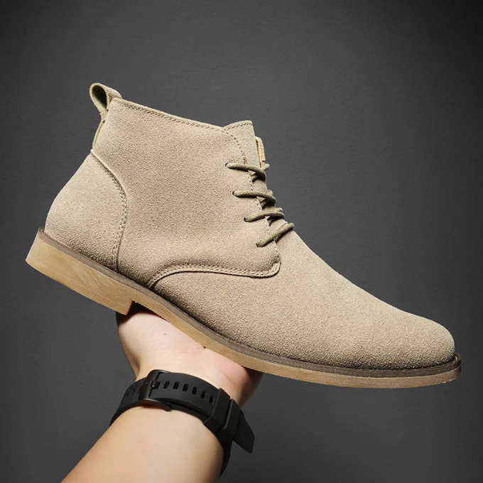 Overhead view of men's durable suede chukka boots, featuring a sturdy construction.