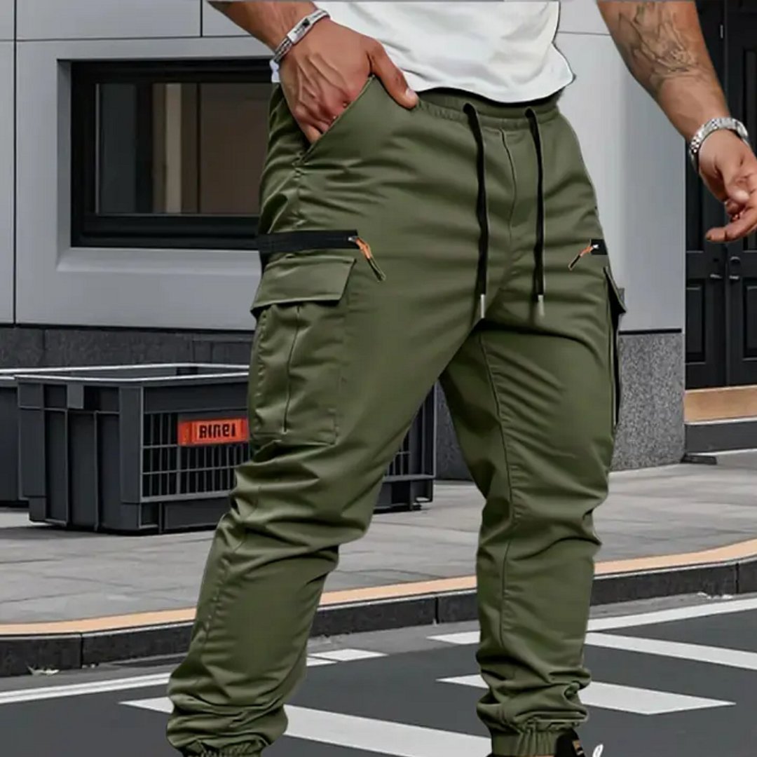Durable men's cargo jogger pants with adjustable waist, great for activewear and a modern tapered look.
