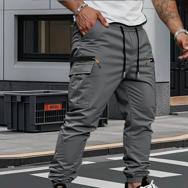 Versatile men's stretch cargo joggers in army green, grey, or black for ultimate comfort & style.
