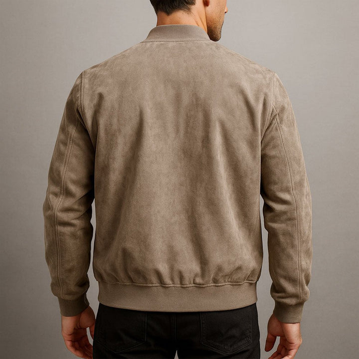 Back view of a modern men's structured bomber jacket, highlighting its clean lines and tailored silhouette.