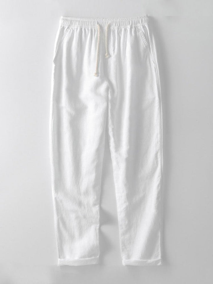 Beige men's two-piece co-ord set with band collar shirt & relaxed fit trousers, perfect for casual.