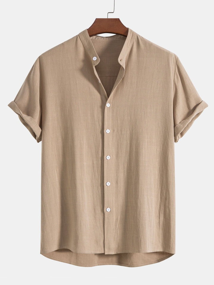Modern men's matching co-ord set: band collar short sleeve shirt & relaxed fit trousers for a stylish look.