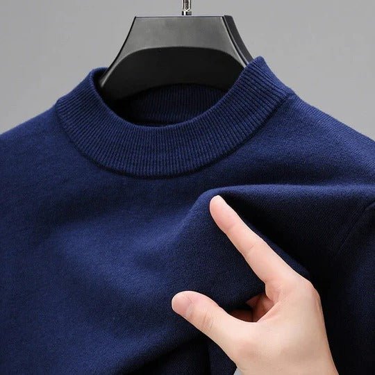 Comfortable men's mock neck pullover sweater in a soft knit, ideal for layering or solo wear. Everyday style.