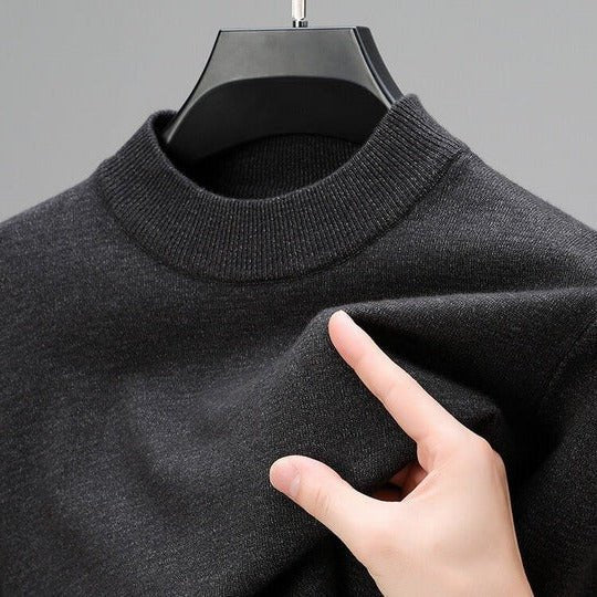 Men's elegant mock neck pullover sweater paired with trousers, perfect for smart casual or daily comfort.