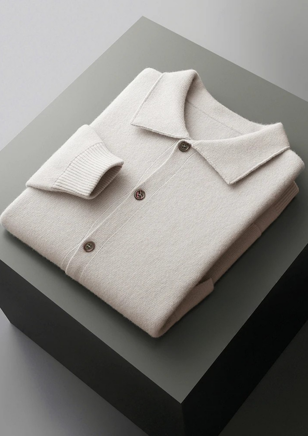 Versatile men's button-up cardigan, ideal for casual or smart casual layering, features convenient patch pockets.
