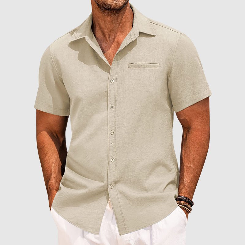 Vibrant men's casual short sleeve button-down shirt with chest pocket, a stylish choice for summer fashion.