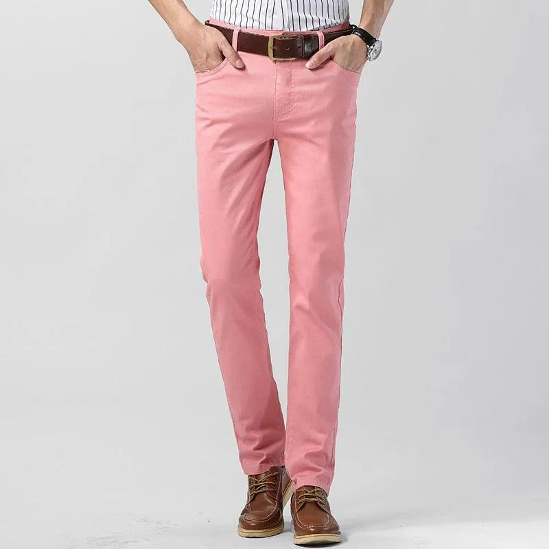 Man wearing vibrant blue men's casual trousers, showcasing modern fit & comfortable style.