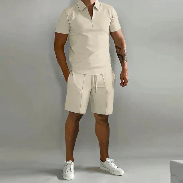 Stylish & comfortable men's summer two-piece set, featuring a casual polo shirt and matching shorts.