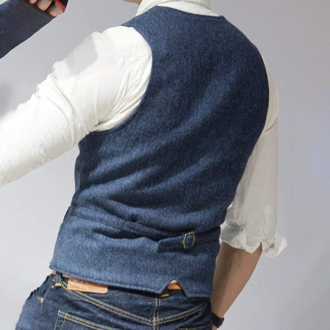 Grey tailored men's wool blend gilet vest, a smart casual or formal outerwear fashion essential.
