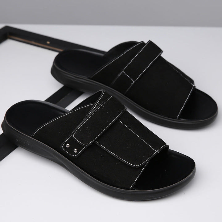 Pair of men's casual suede slide sandals, showcasing their versatile design.